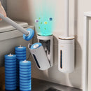 Escova sanitária com cabeças descartáveis e suporte de parede, ideal para limpeza profunda e higiênica do vaso sanitário.