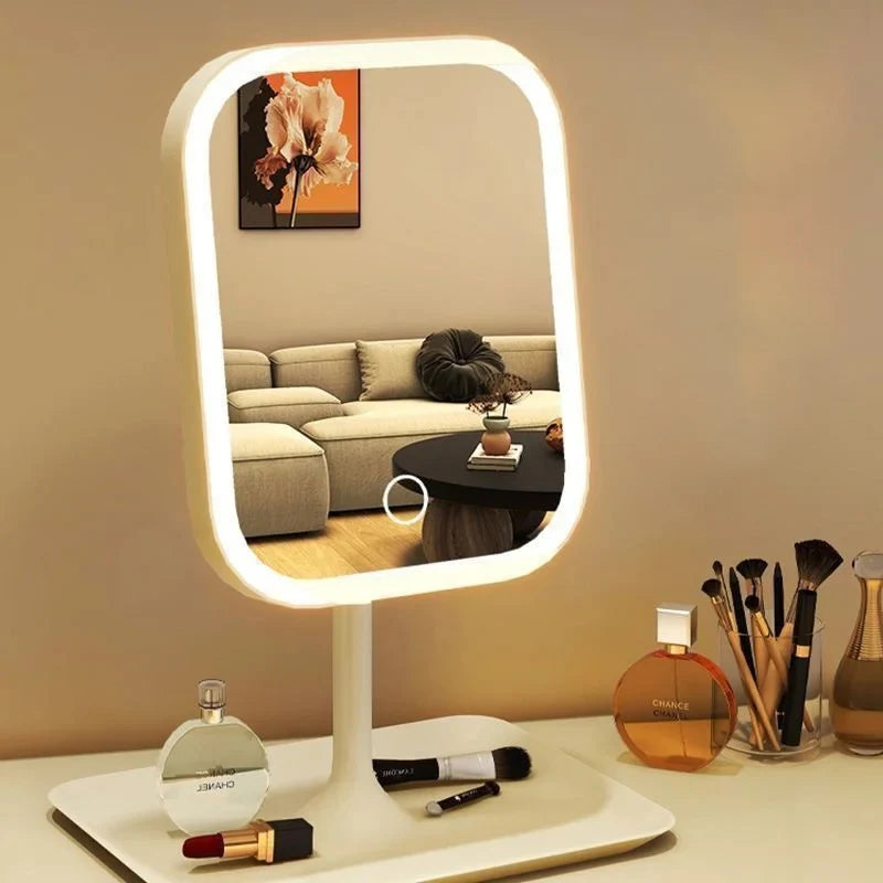 Espelho de maquiagem LED com controle touch, três tons de iluminação e base organizadora para cosméticos, ideal para penteadeira e cuidados diários.