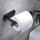 Suporte adesivo preto para papel higiênico instalado na parede do banheiro, com design moderno em aço inoxidável e fixação sem furos.